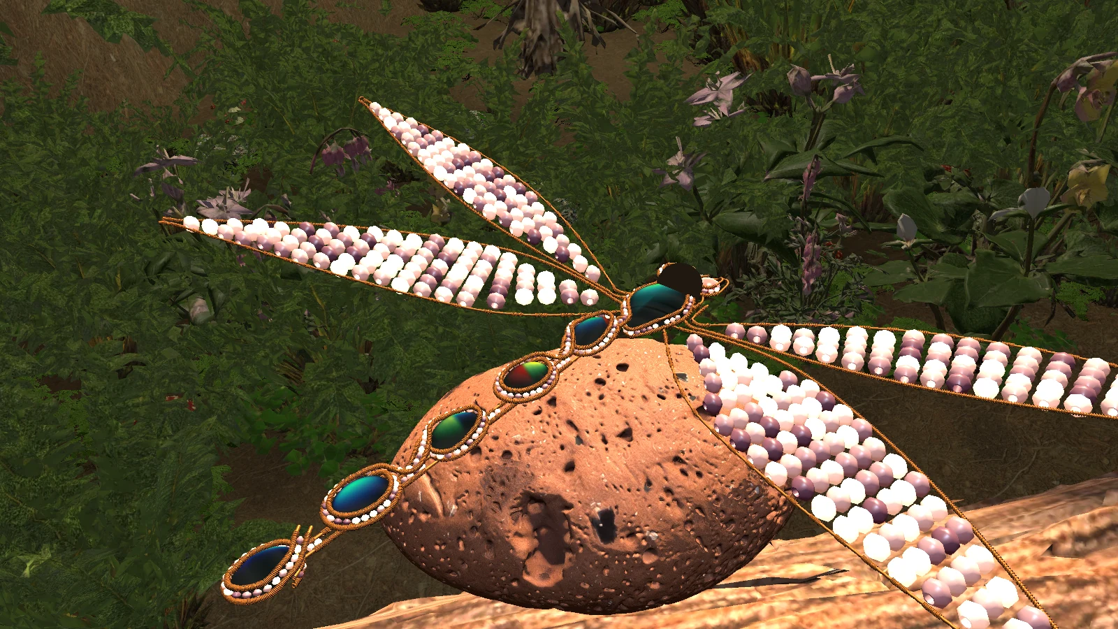 An in-engine dragonfly with beaded wings and a series of stones, perched on lava stone.
